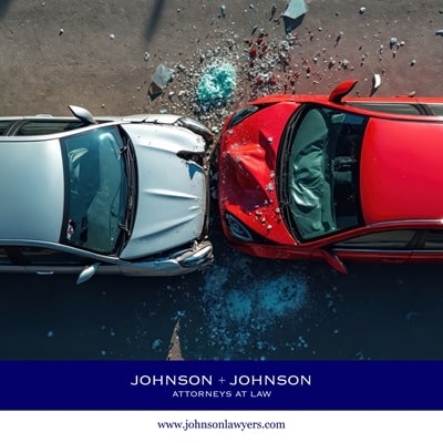 Overhead view of two damaged cars after a Saluda, South Carolina car accident, surrounded by shattered glass and debris