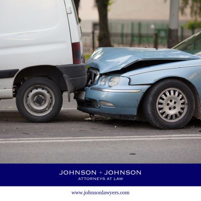 A blue car with front-end damage hitting the rear-end of a white van in South Congaree