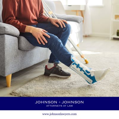 After an accident in South Congaree, SC, the injury victim sits on a couch with a broken leg and crutches
