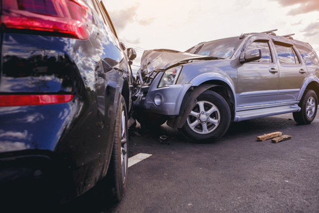 Two cars crashing into each other