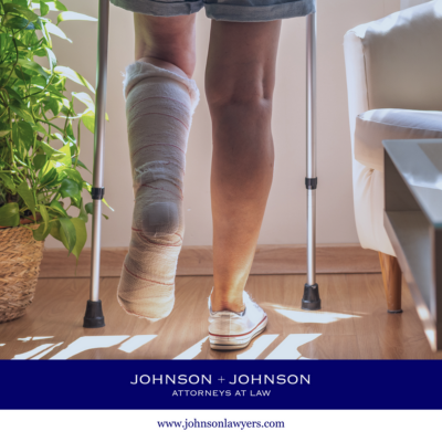 Personal injury victim in Irmo, SC with a bandaged leg using a walker indoors