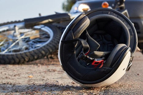 a motorcycle accident in South Carolina shows a bike and helmet on the ground following a crash.